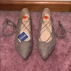 Tan cross string flats